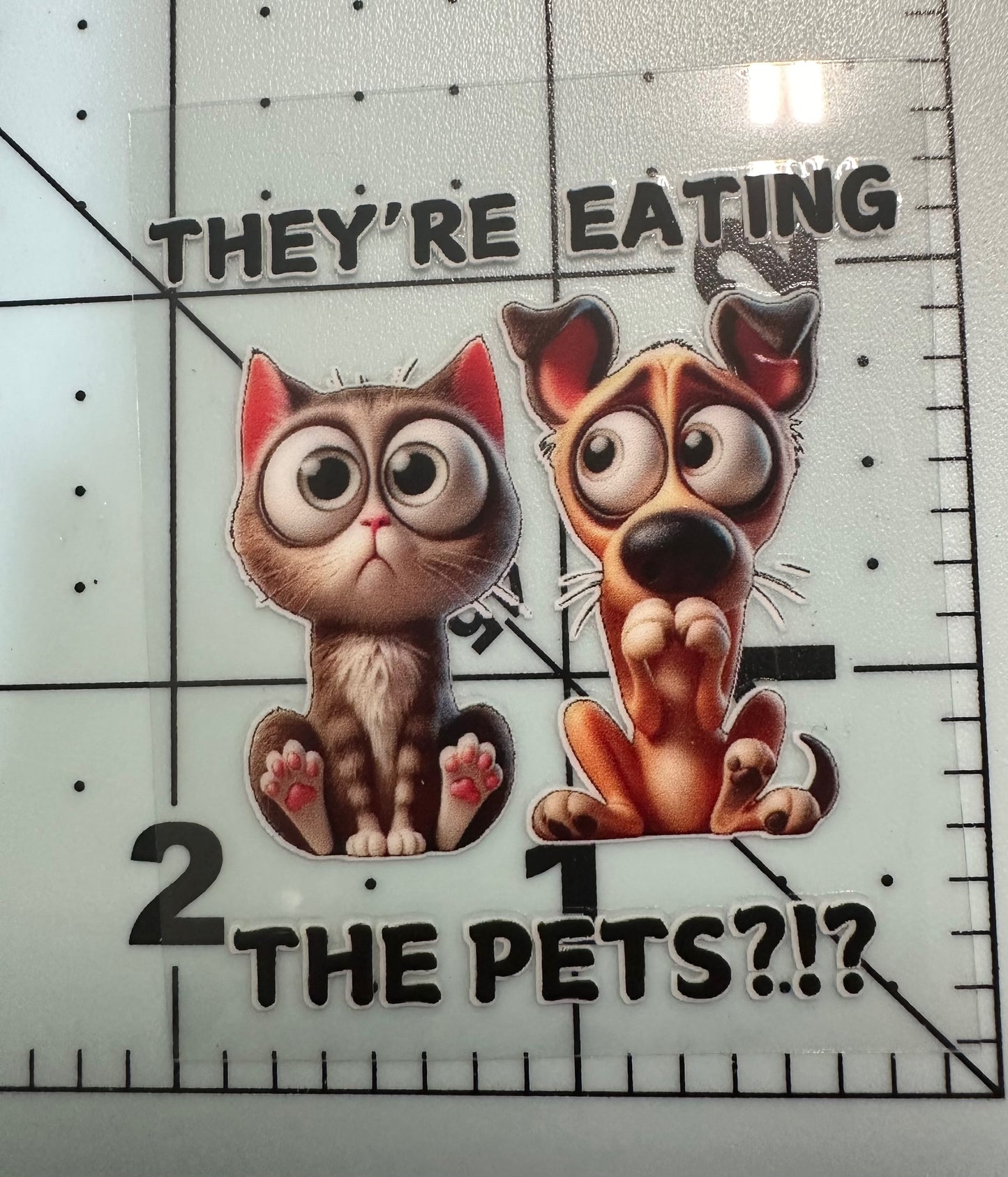 They're Eating the Pets ?!? UVDTF Sticker